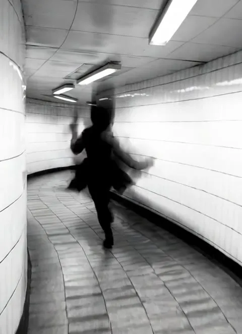 Study of a running figure in a lit tunnel, from the house collection.